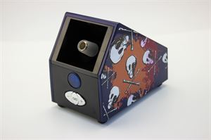 Picture of Orange and blue sunburst with skulls stationary vaporizer