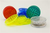 Picture of Solid color plastic grinder. 1 layer with stroage top